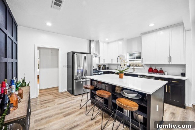 Modern kitchen with quartz countertops and stainless steel appliances at 1731 Seevers Avenue