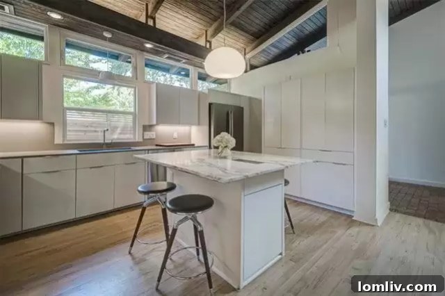 Vast, inviting living space within 7358 Fieldgate Drive, featuring original brick floors and ample natural light