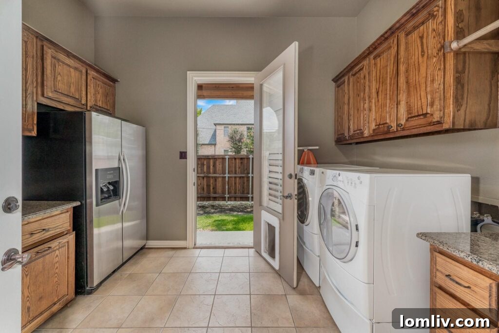 Spacious and functional laundry room with a large utility sink and exterior access
