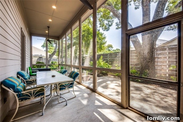Exterior view of an energy-efficient home by Hoffman Homes surrounded by mature pecan trees