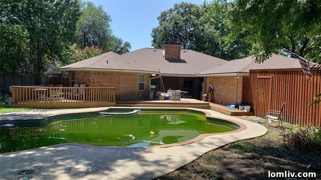 Expansive Backyard with Pool and Deck at 3105 Saint Ives Court