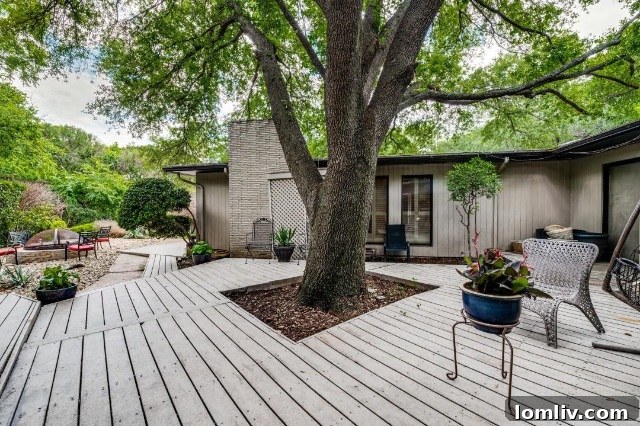 Another angle of the vast backyard, showcasing the potential for outdoor living