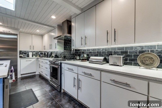 Gourmet chef's kitchen featuring high-end restaurant-grade appliances in Fort Worth