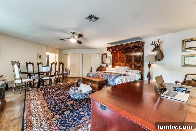 Expansive primary bedroom suite, offering ample space and natural light
