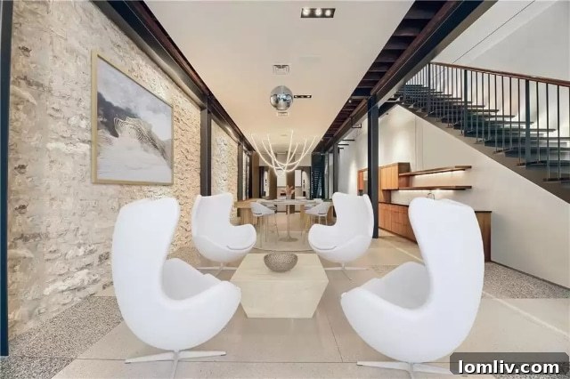 Elegant entry hall leading to flexible spaces
