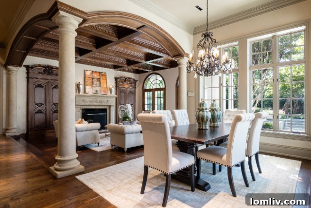 Elegant Formal Dining Room with Hand-Carved Mantle and Crystal Chandelier