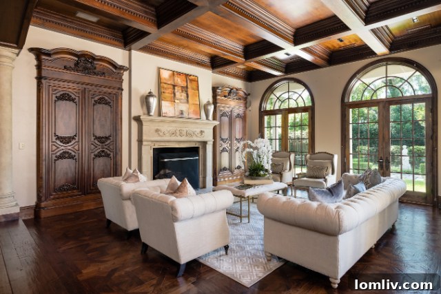 Comfortable Family Room with Coffered Ceiling and Pool Views