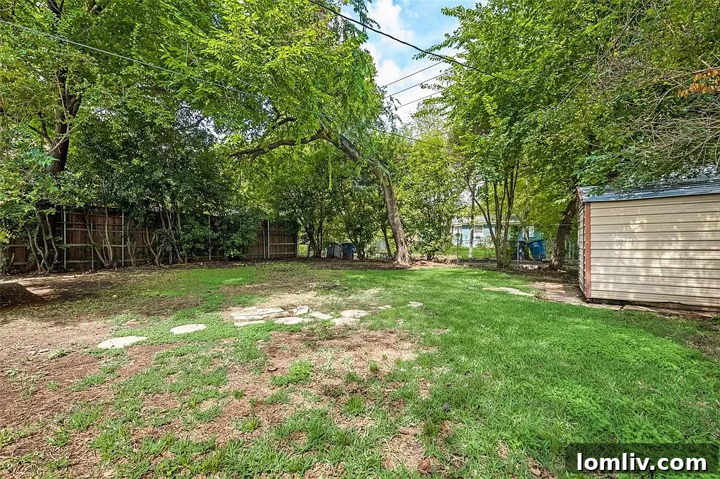 East Dallas Country Club A World of Opportunity 8 Expansive shaded backyard with green space and storage shed at 10841 Sharondale Drive