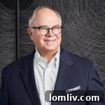 Robbie Briggs, CEO of Briggs Freeman Sotheby’s International Realty, seen smiling, discusses the new partnership with Peerage Realty Partners.