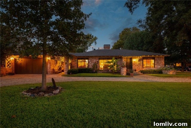 Stunning Charles Dilbeck inspired home exterior at 7159 Wildgrove Avenue near White Rock Lake