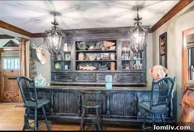 Bar Area with Floating Dog Head and Bright Lights in Unique Kansas City Home