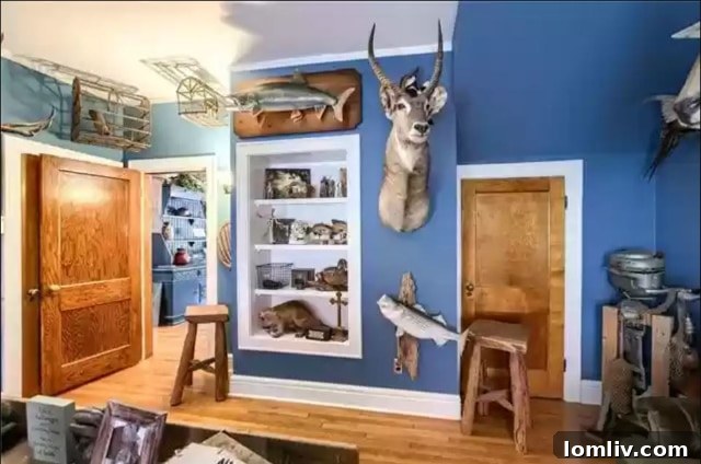 Unusual Room with Taxidermy, Crosses, and Outboard Motor in Kansas City Home
