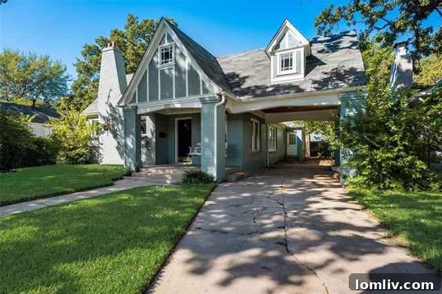 Charming Oakhurst Tudor Style Home Exterior in Fort Worth with Manicured Lawn