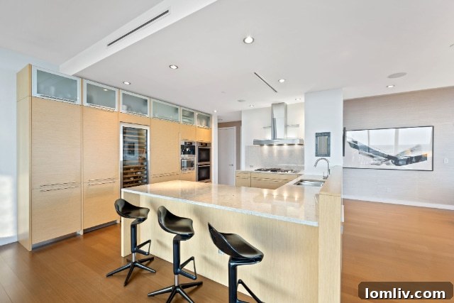 Sophisticated kitchen with updated cabinetry in The Azure #2501.