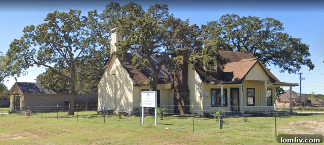 The Gibson-Grant Historic Log House, nestled amidst modern suburban homes in Flower Mound, prepares to open as a museum.