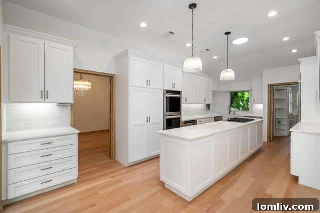 Luxurious kitchen with modern appliances and marble island