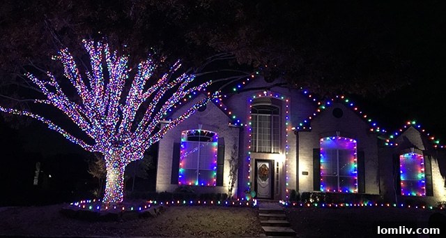 A stunning display of professional Christmas lighting outlining a home's architectural features, showcasing Everclear's meticulous work.