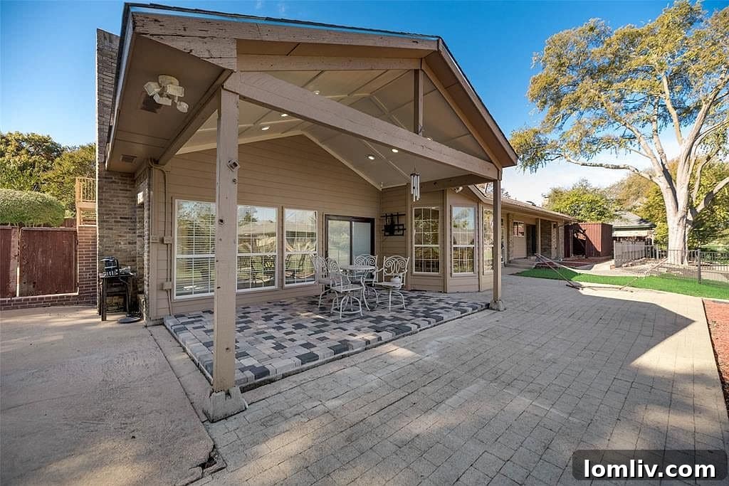 Spacious Backyard with Covered Patio and Sport Court