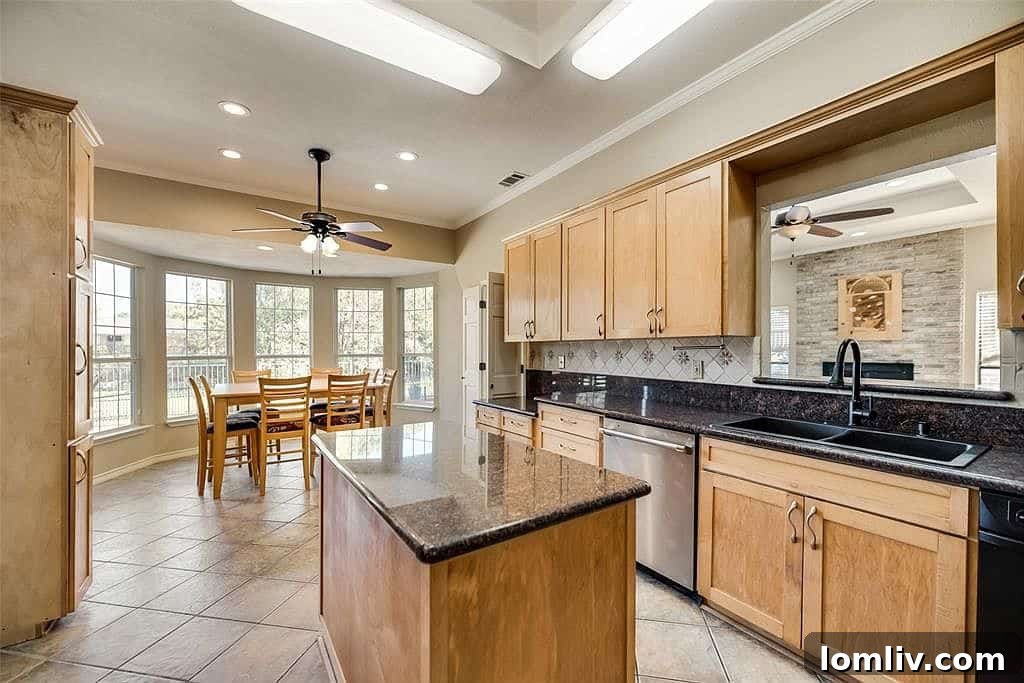 Second Living Area with Media Setup and Tray Ceiling