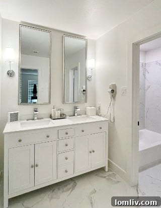 Modern bathroom vanity with integrated wall-mounted hairdryer