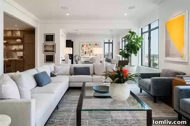 The Ritz-Carlton Residences Dallas: Grand entrance and luxurious facade, reflecting urban sophistication.