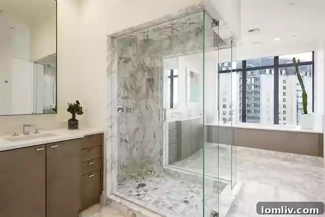 Detailed view of a luxurious vanity and mirror in one of the bathrooms at Ritz-Carlton Dallas Residences.