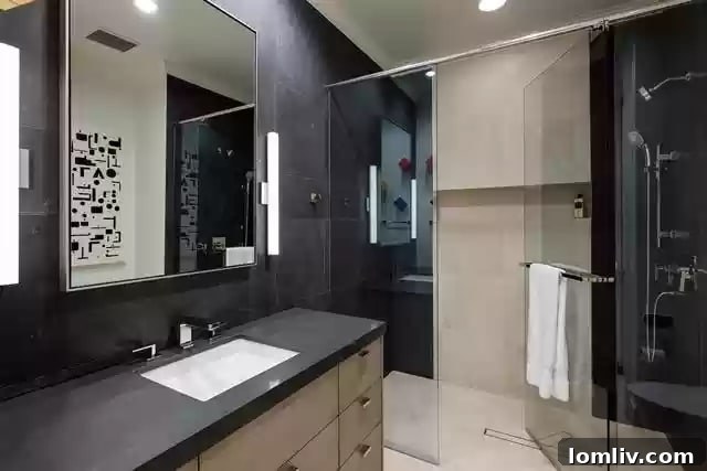 Elegant powder room with contemporary design and high-quality materials at Ritz-Carlton Dallas condo.