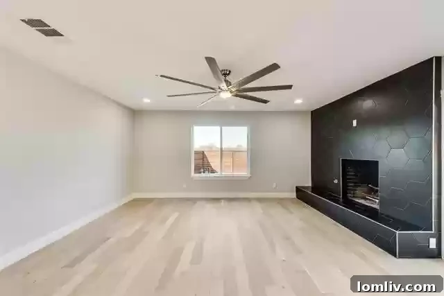 Spacious living area showcasing open-concept design and natural light.