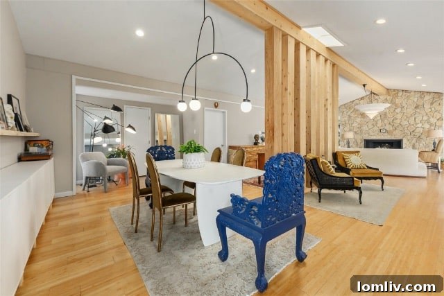 Open concept living and dining space with elegant design
