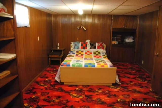 Another cozy bedroom with a traditional quilted bedspread and simple furnishings.