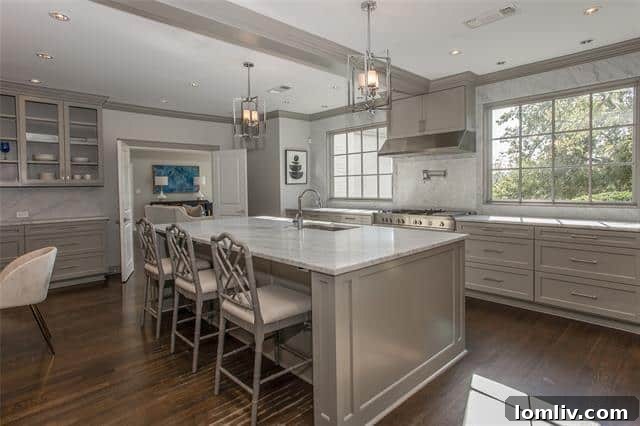 Gourmet Kitchen with Carrara Marble Island and High-End Appliances