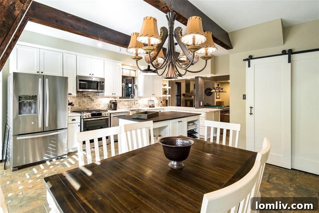 Elegant dining area with wooden table and exposed beam ceiling