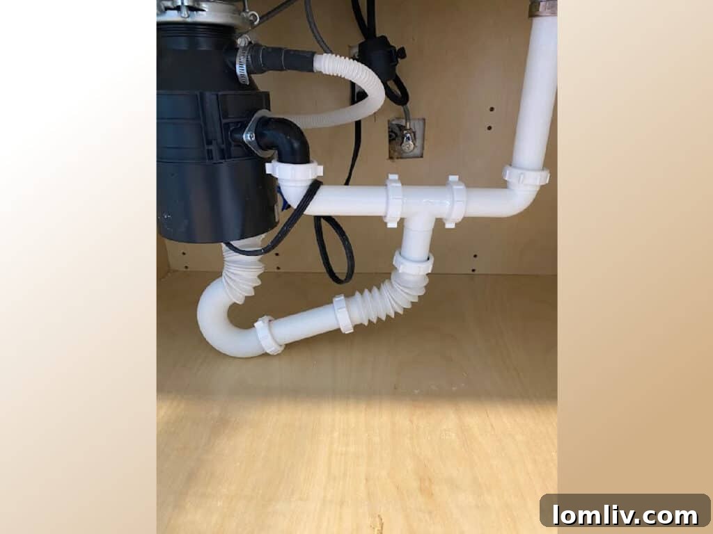 Kitchen Sink Plumbing Problems: Why Accordion Pipes and Uphill Drains are Disasters