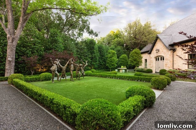 An opulent outdoor living area featuring comfortable lounge seating, a refined patio, and artfully arranged greenery, designed by From the Ground Up Landscape