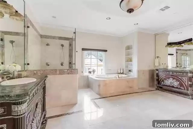 Luxurious bathroom with imported chest vanities and heated floors