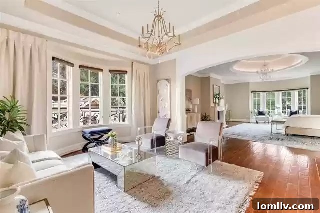 Elegant second-floor primary bedroom with plush furnishings