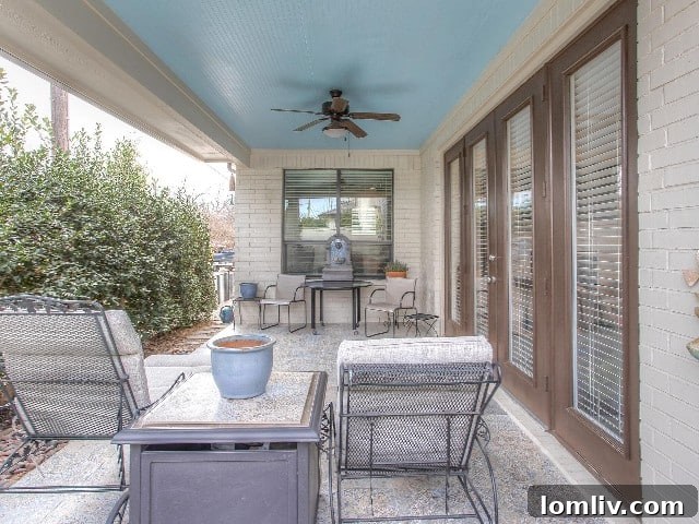 Relaxing patio area of a garden home, signifying maintenance-free living