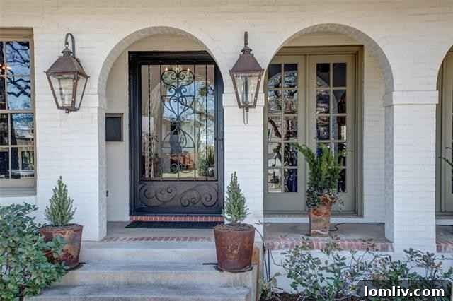 Entrance of 505 Eastwood Avenue, curved walkway, iron door