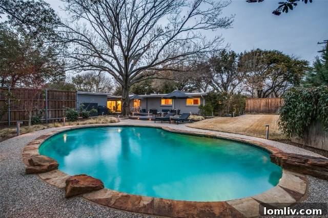 Outdoor Living Space with Pool and Custom Features in Disney Streets Home