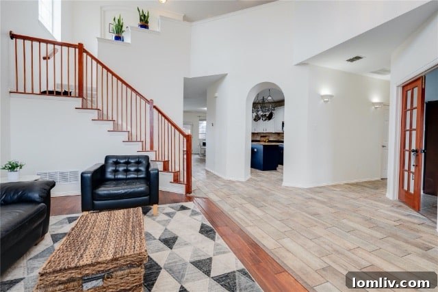 Inviting interior view, showcasing a spacious living area or entryway in the West Plano home