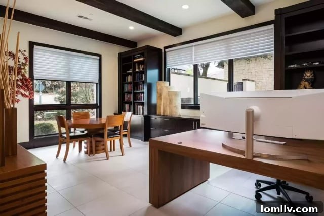Lake Forest's Singular Gem: Rising Above Zero Lot Line Living 11 Luxurious Primary Suite with Fireplace and Pool Views at 7107 Lake Edge Drive