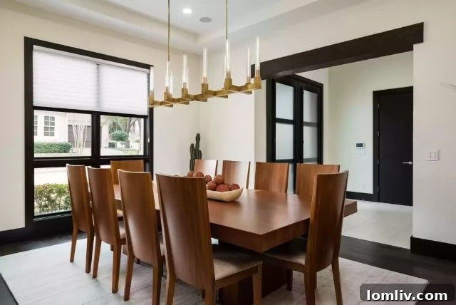 Lake Forest's Singular Gem: Rising Above Zero Lot Line Living 6 Spacious Living Room with 22-Foot Ceiling and Linear Fireplace