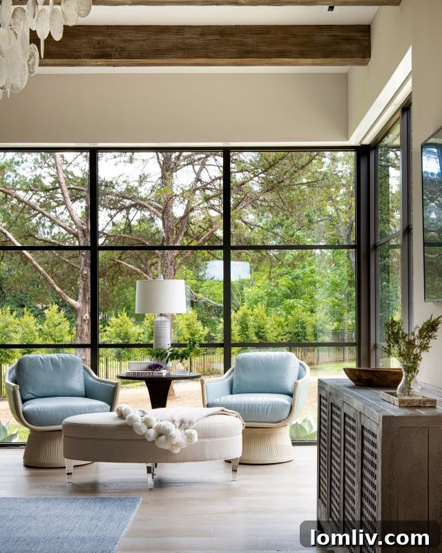 A beautifully appointed living area with a fireplace, characteristic of Erin Sander's elegant designs.