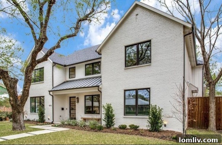 Elegant transitional-style home exterior in Dallas by Caruth Custom Homes