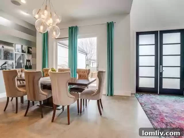 Elegant entrance foyer with polished concrete floors and high ceilings
