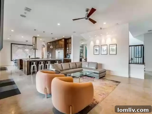 Gourmet kitchen with dual islands and high-end stainless steel appliances