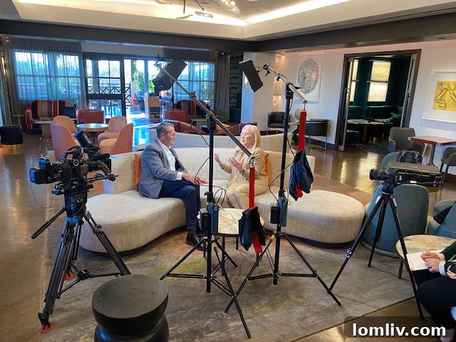Richard Quest and Candy filming at Park House in Highland Park Village, Dallas, for CNN.