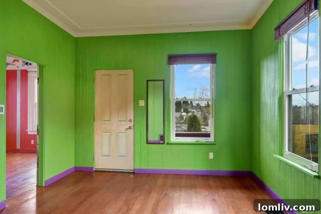 Vibrant living room with bold lime green walls and striking purple trim
