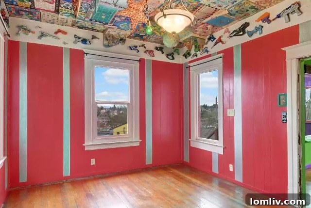 Room with a collection of ray guns displayed creatively on the walls and ceiling