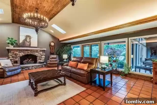 Spacious Living Room with Authentic Mexico Saltillo Tile and Stone Fireplace
